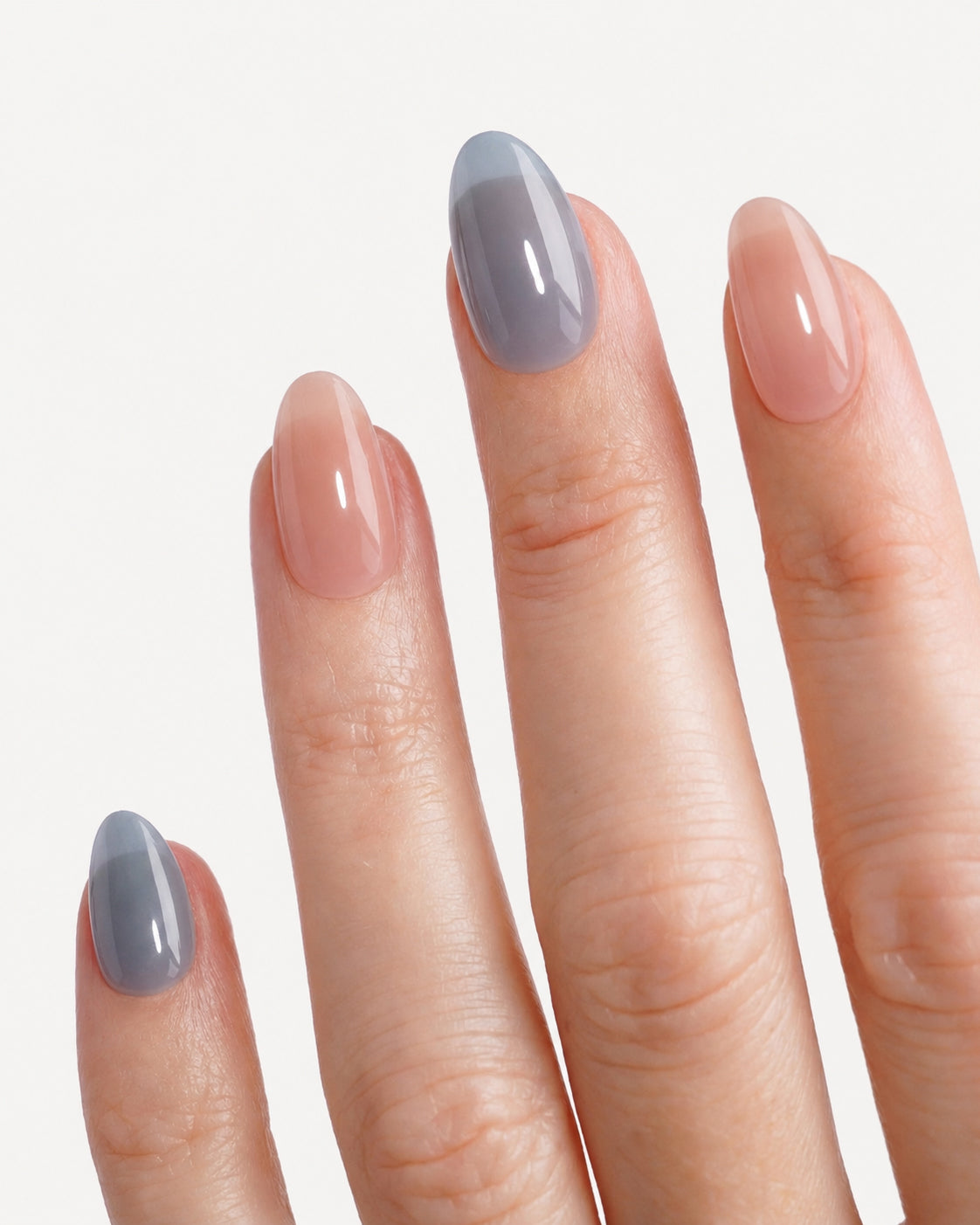Charming Blossoms reversible almond press-on nails featuring glossy gray and nude gel manicure colors