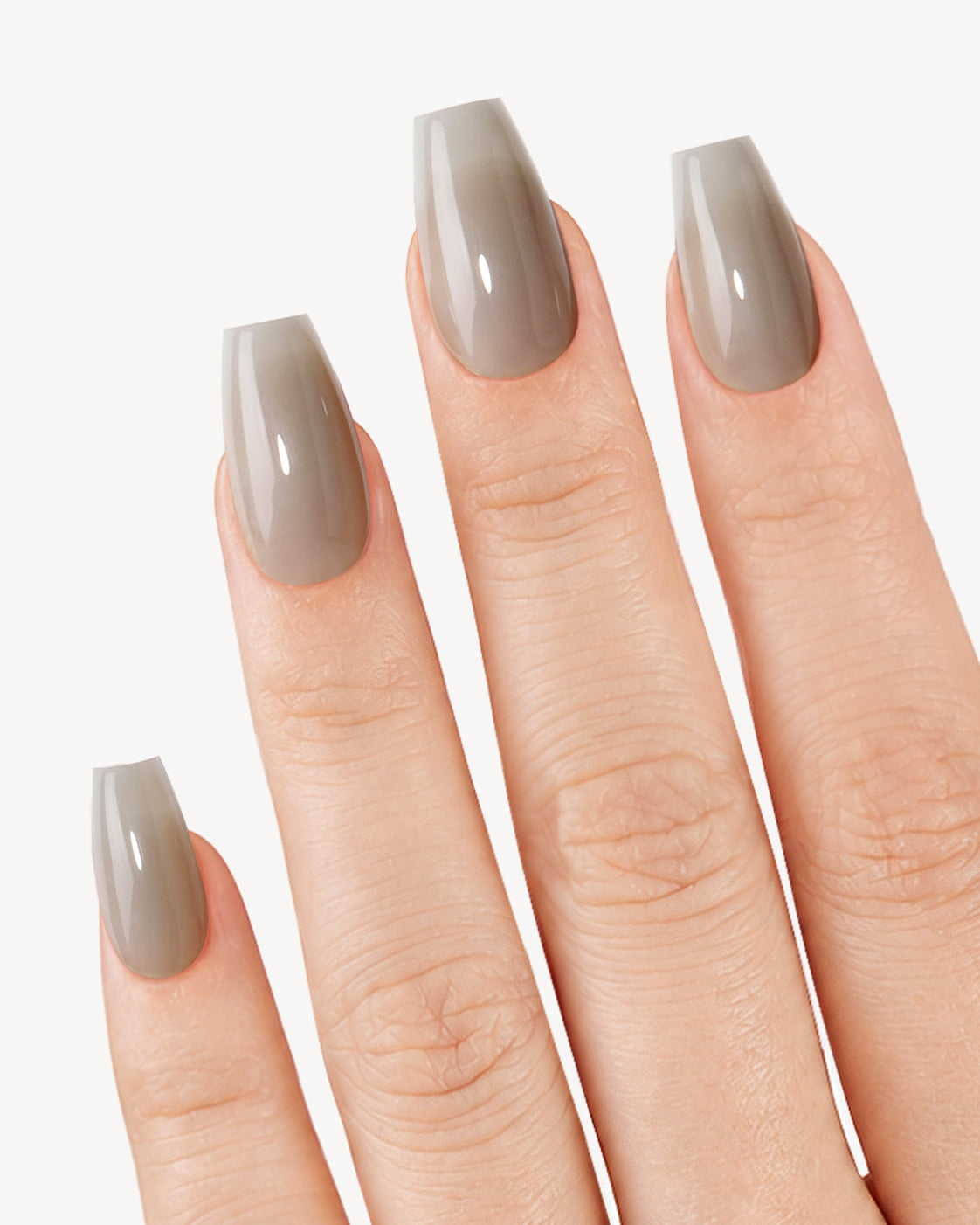 VSALON Fluffy Cloud short coffin soft gel press-on nails worn on hand in a glossy taupe-gray shade