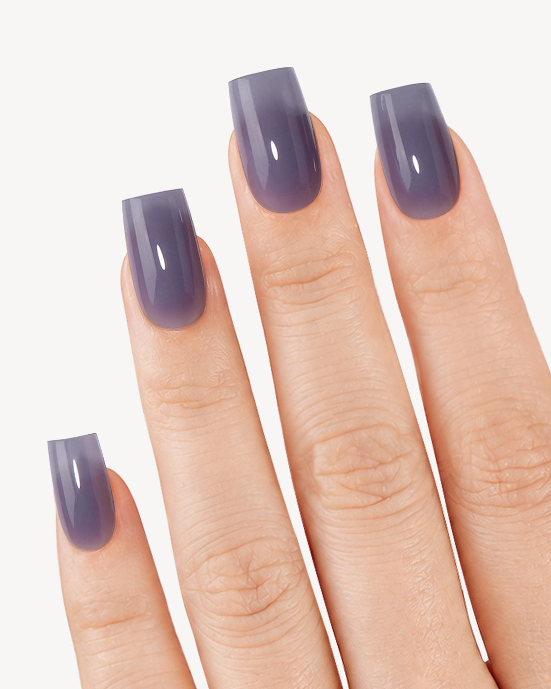 VSALON Phantom short square soft gel press-on nails worn on hand in a glossy smoky slate-blue shade