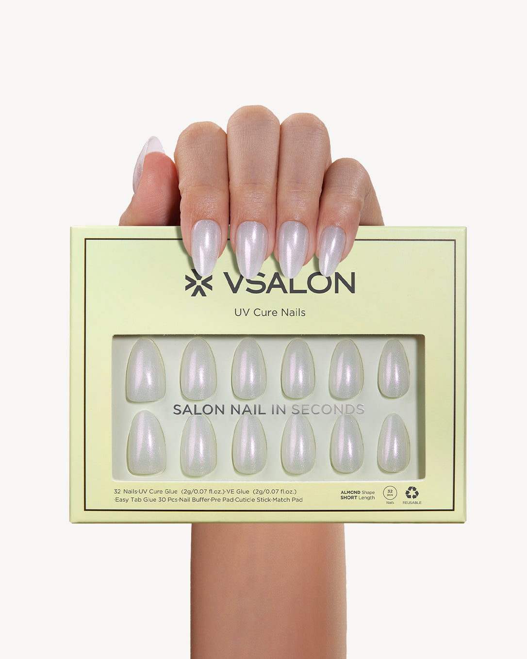 Aurora's Angel pearl shimmer press-on nails displayed with VSALON manicure box and nail set