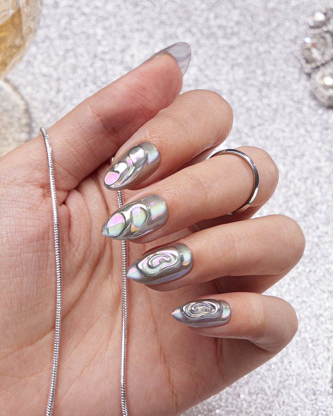 Unicorn holographic press-on nails creating a bold, magical and eye-catching fantasy manicure look