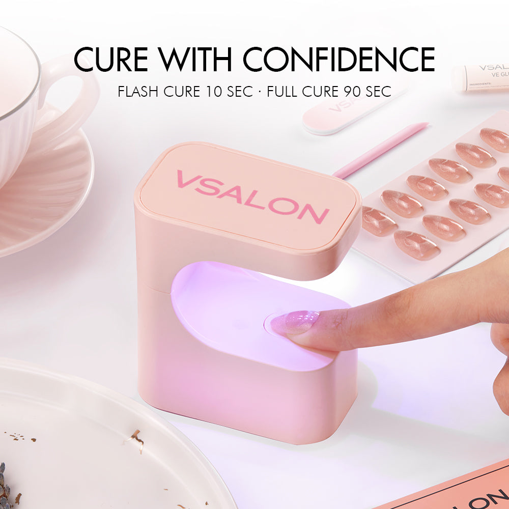 Curing a UV press-on nail under a VSALON lamp with a 10-second flash cure and 90-second full cure