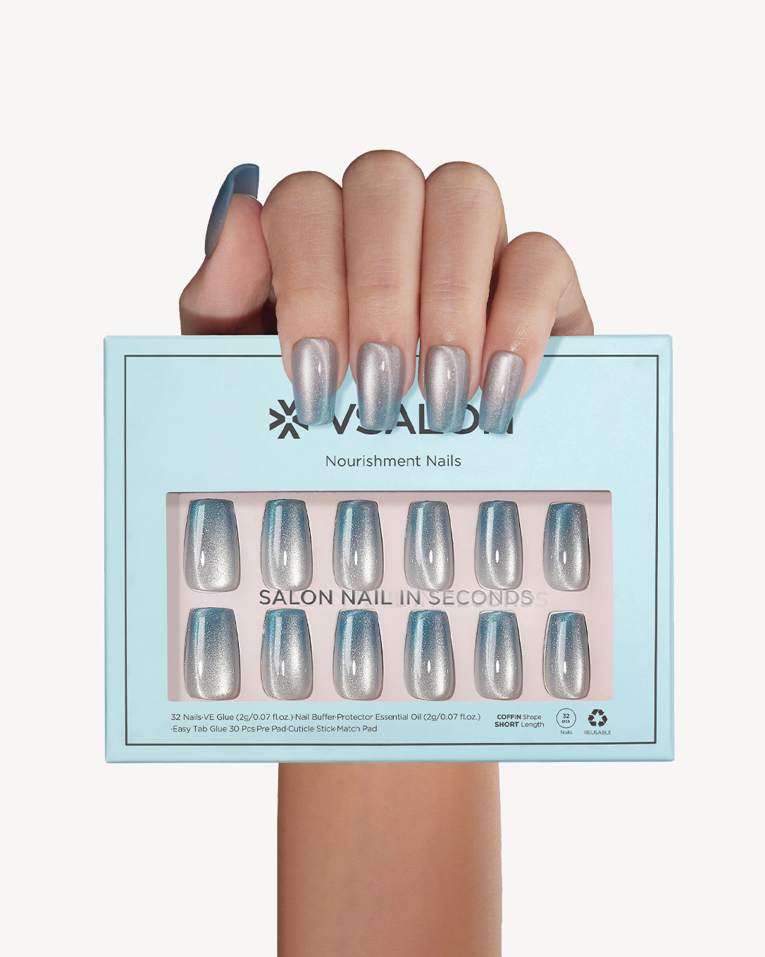 Hand holding VSALON Crystal Tide press-on nails with a sparkling cat-eye shimmer design.