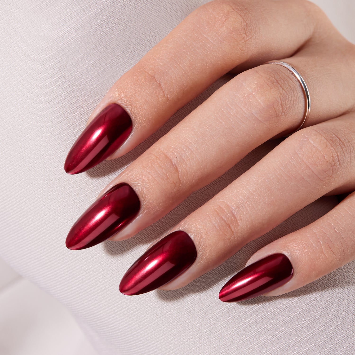 VSALON Nourishment Nails “Bourgogne Glide” Red Short Almond Press On Nails – elegant look worn on hands.