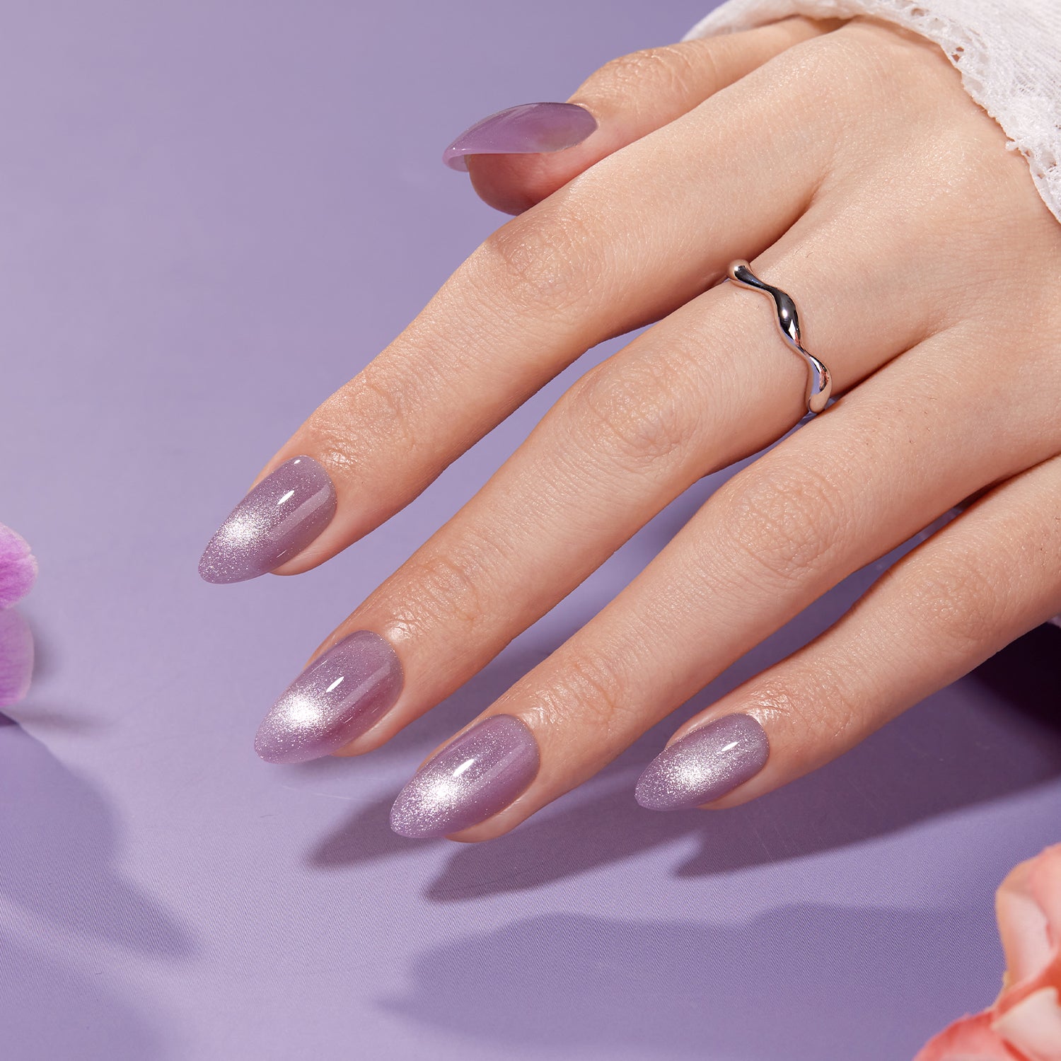 pastel purple easter nails on hand, perfect for spring outfits