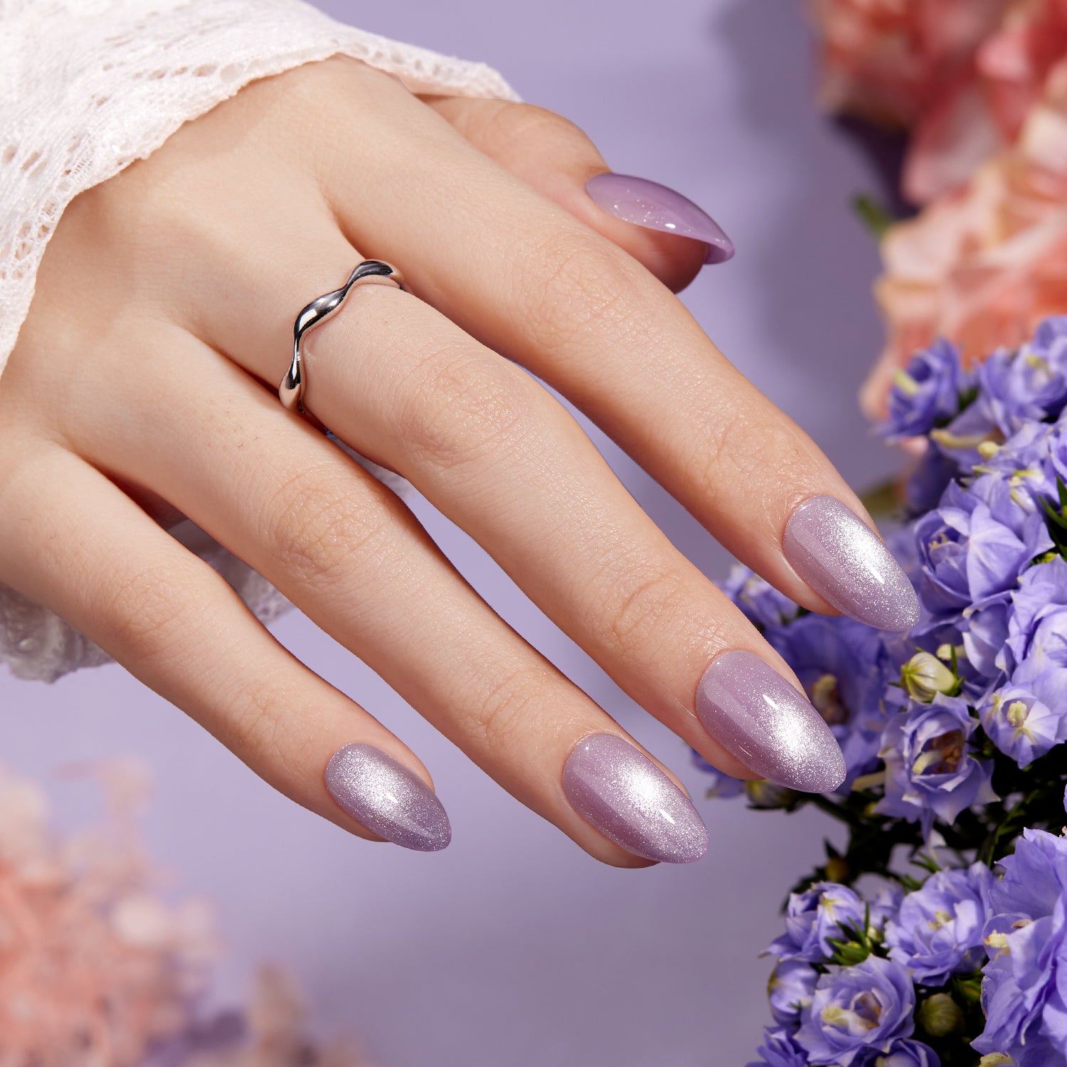 pastel purple easter nails on hand, perfect for spring outfits,almond shape