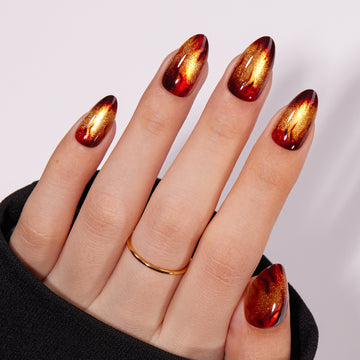 files/vsalon-amber-whisper-nourishment-golden-brown-cat-eye-flame-medium-almond-press-on-nails-hand-model-01.jpg