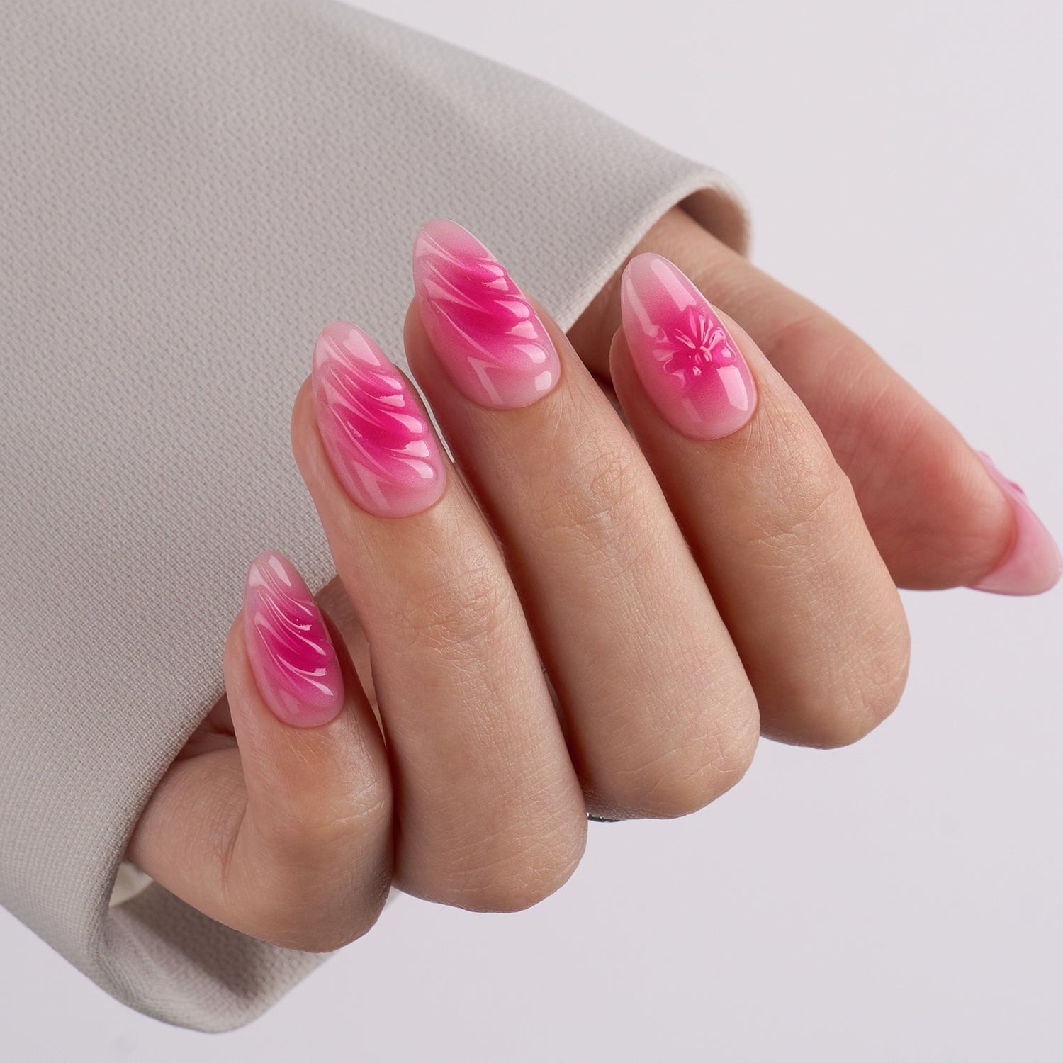 VSALON Dual Glam Nails Barlow Girl Pink French Tips Short Almond Press On Nails - Close-up of model's hand bending fingers to hold VSALON press on nails – highlighting nail design and color details