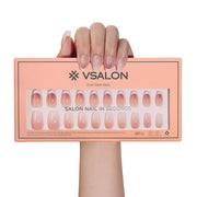 VSALON Dual Glam Nails Belle De Jour French Tips Short Coffin Press On Nails - model's hand holding the top of the box – displaying nail design and product packaging