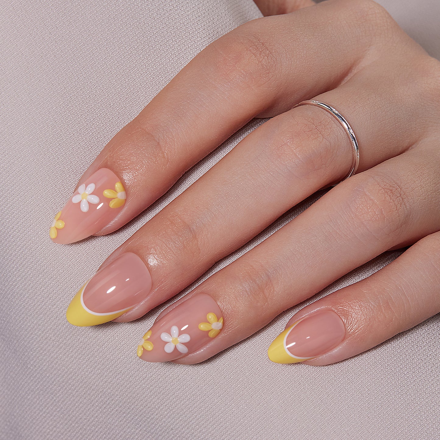 VSALON Nourishment Chamomile Floral Short Almond Press On Nails - natural look on hand model