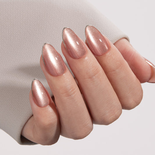 VSALON Nourishment Champagne Glaze pink Short Almond Press On Nails - model wearing