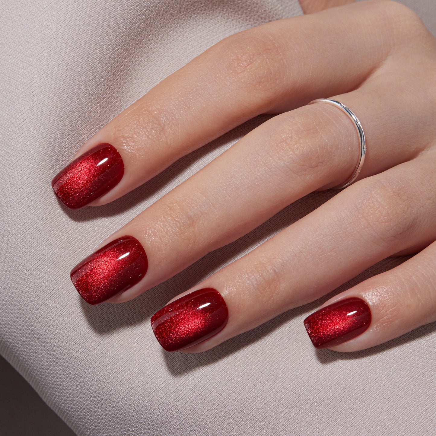 VSALON Nourishment Cider Red Cat Eye Short Square Press On Nails - styled for a holiday party look.