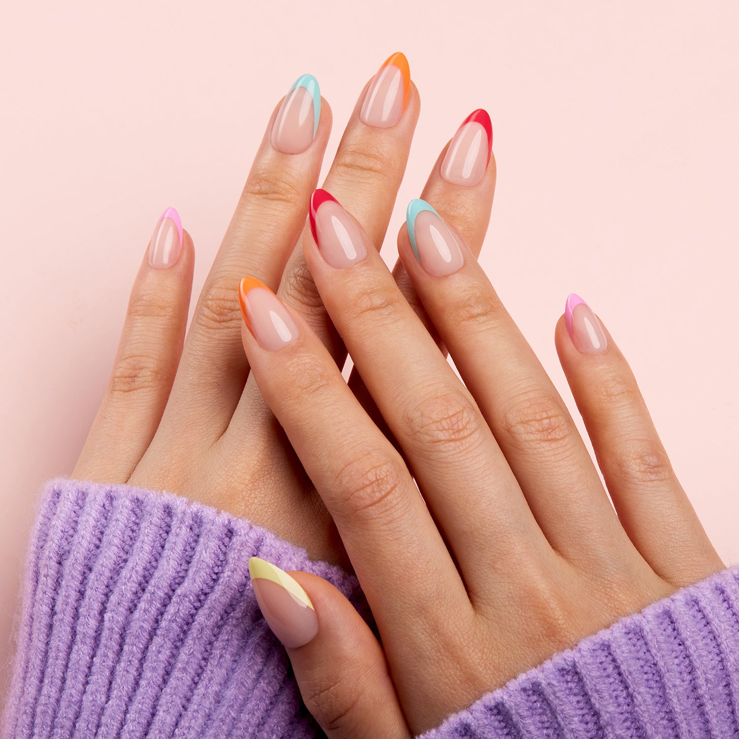 VSALON Nourishment Color Pop French Tips Short Almond Press On Nails - Model showing nails with both hands – displaying nail design and manicure style