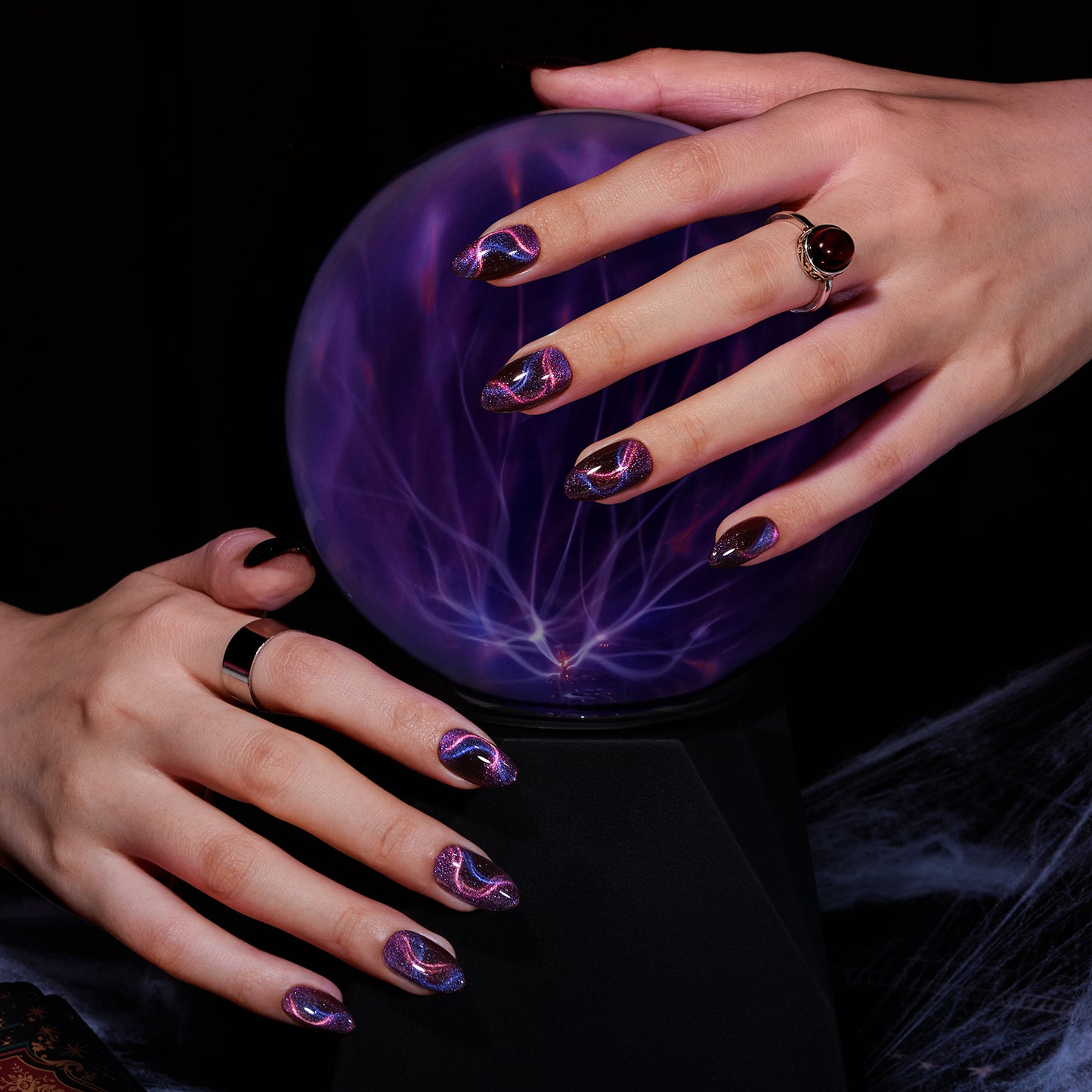 VSALON Nourishment Cosmos Purple Short Almond Press On Nails - styled for a holiday party look.