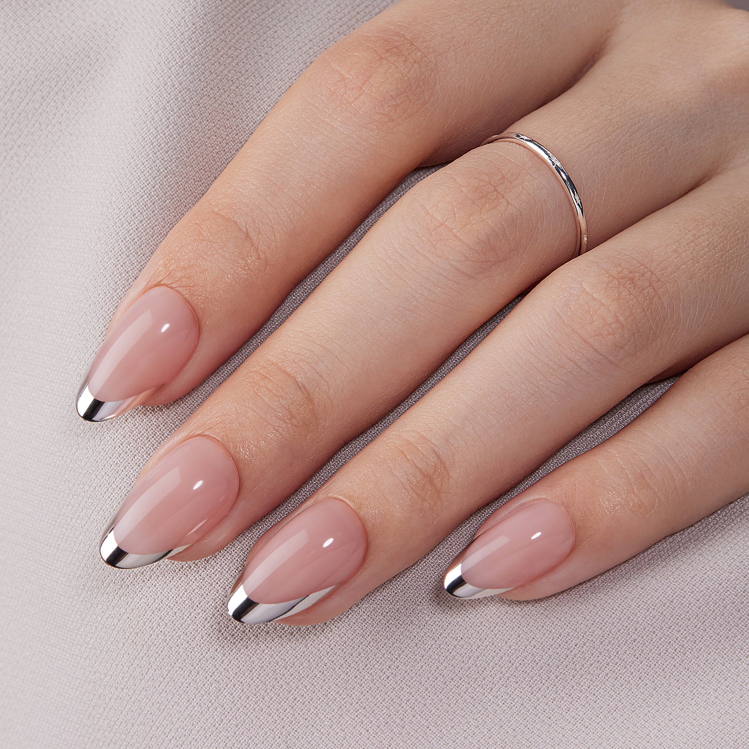 VSALON Dual Glam Nails Discours French Tips Short Almond Press On Nails - model's hand resting on elbow – showcasing nail style and elegant manicure