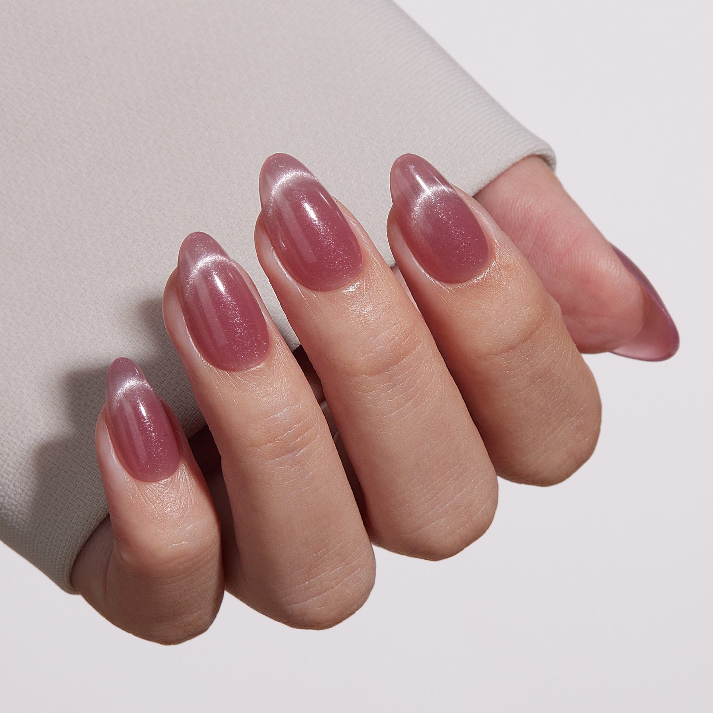 VSALON Dual Glam “Potion” Short Almond Press On Nails – natural look on hand model.