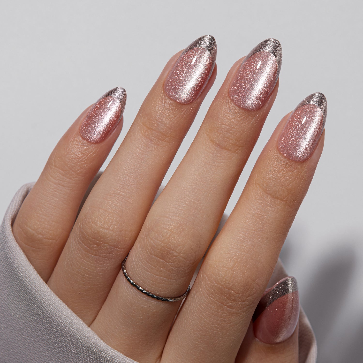 VSALON Nourishment First Dance Pink Metallic French Tips  Short Almond Press On Nails - model wearing