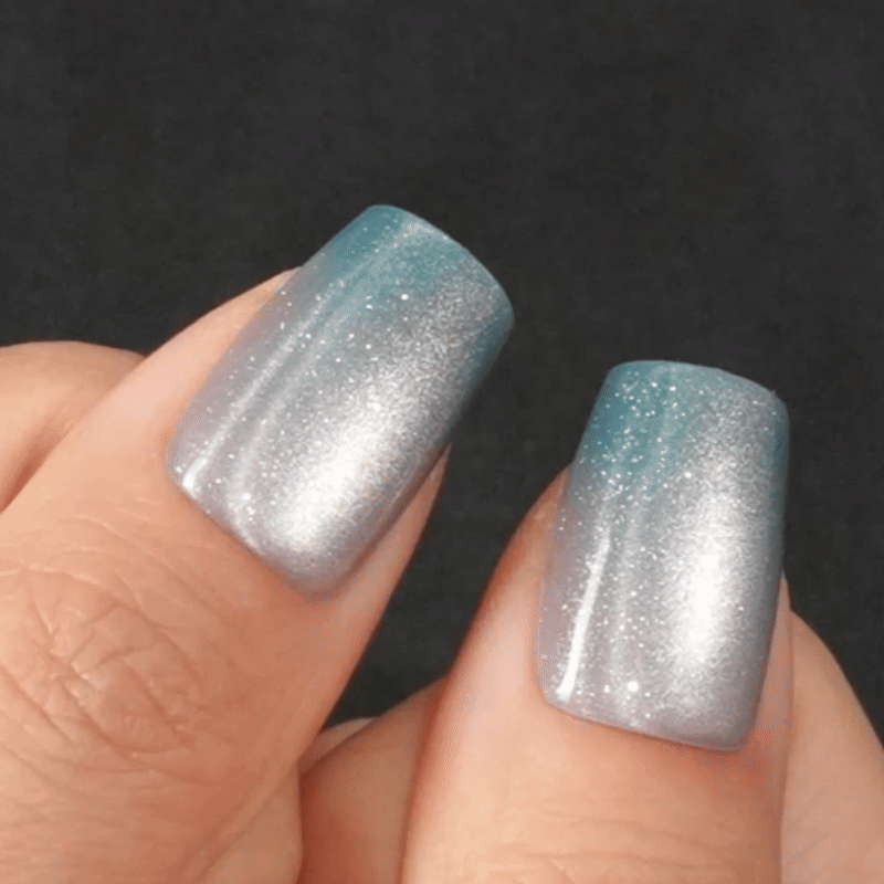 VSALON Nourishment Frozen Muse Silver Ombre Cat Eye Chrome Short Coffin Press On Nails - model wearing