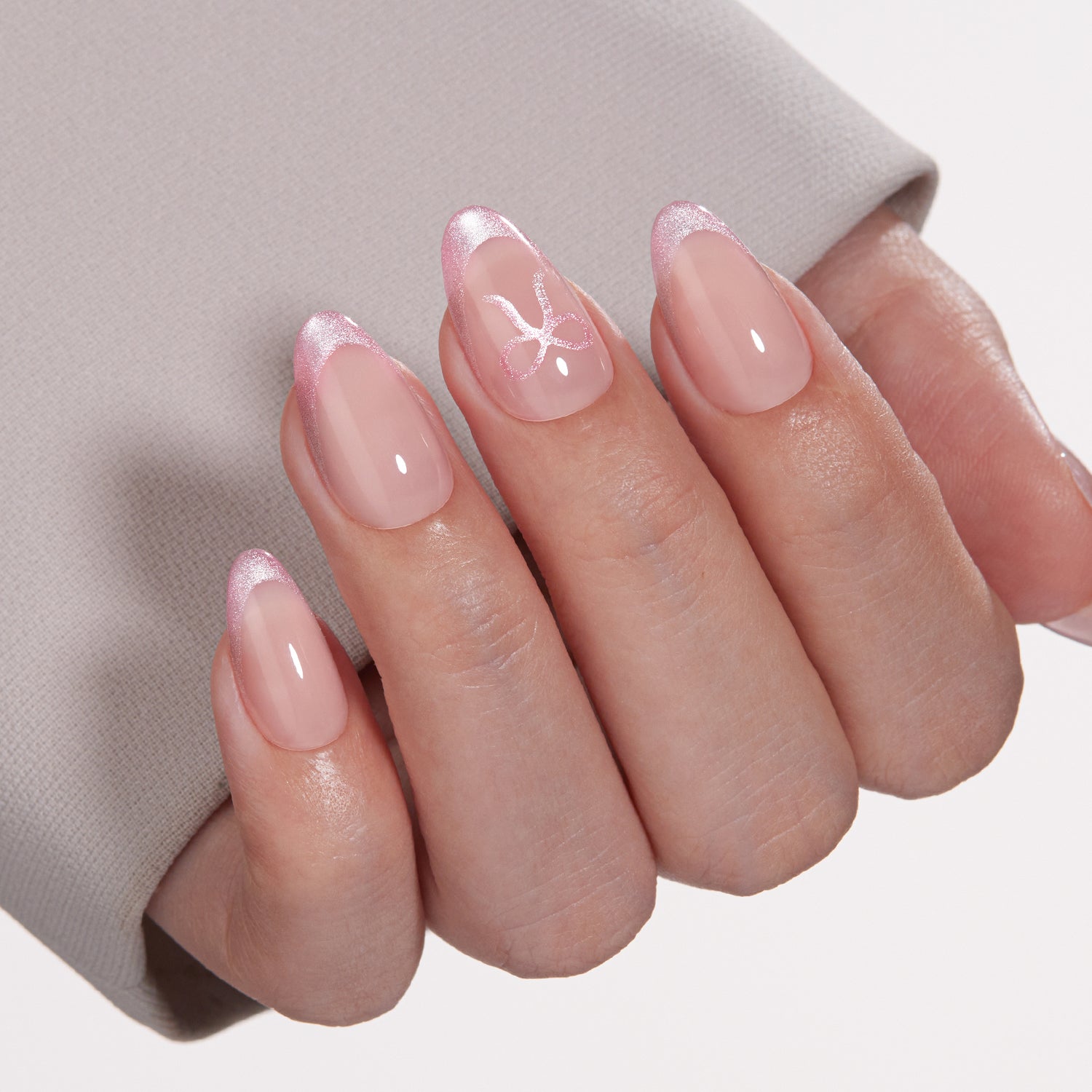 VSALON Dual Glam Nails Lovers Note Bow French Tips Short Almond Press On Nails - Close-up of model's hand bending fingers to hold VSALON press on nails – highlighting nail design and color details