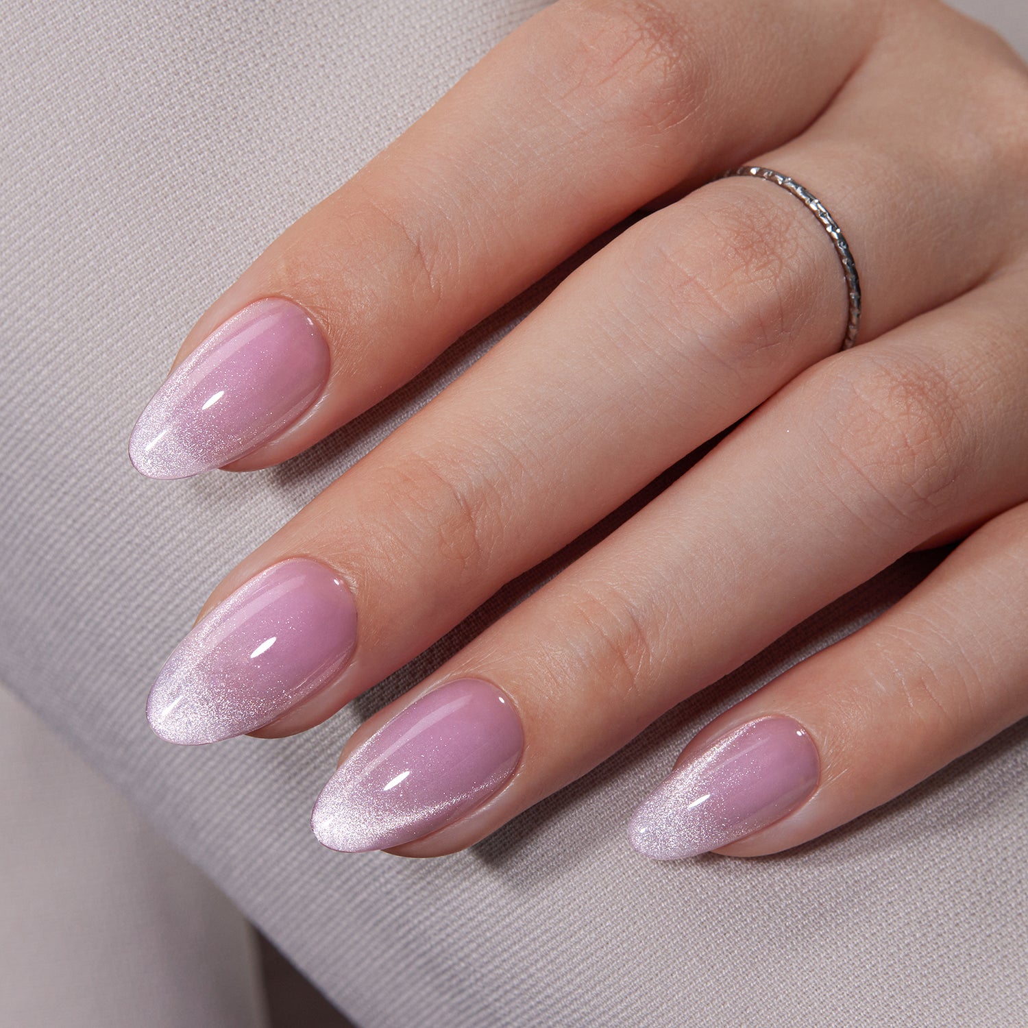 VSALON UV Cure Nails Mist Lilac Lavender Cat Eye Short Almond Press On Nails - model's hand resting on elbow – showcasing nail style and elegant manicure