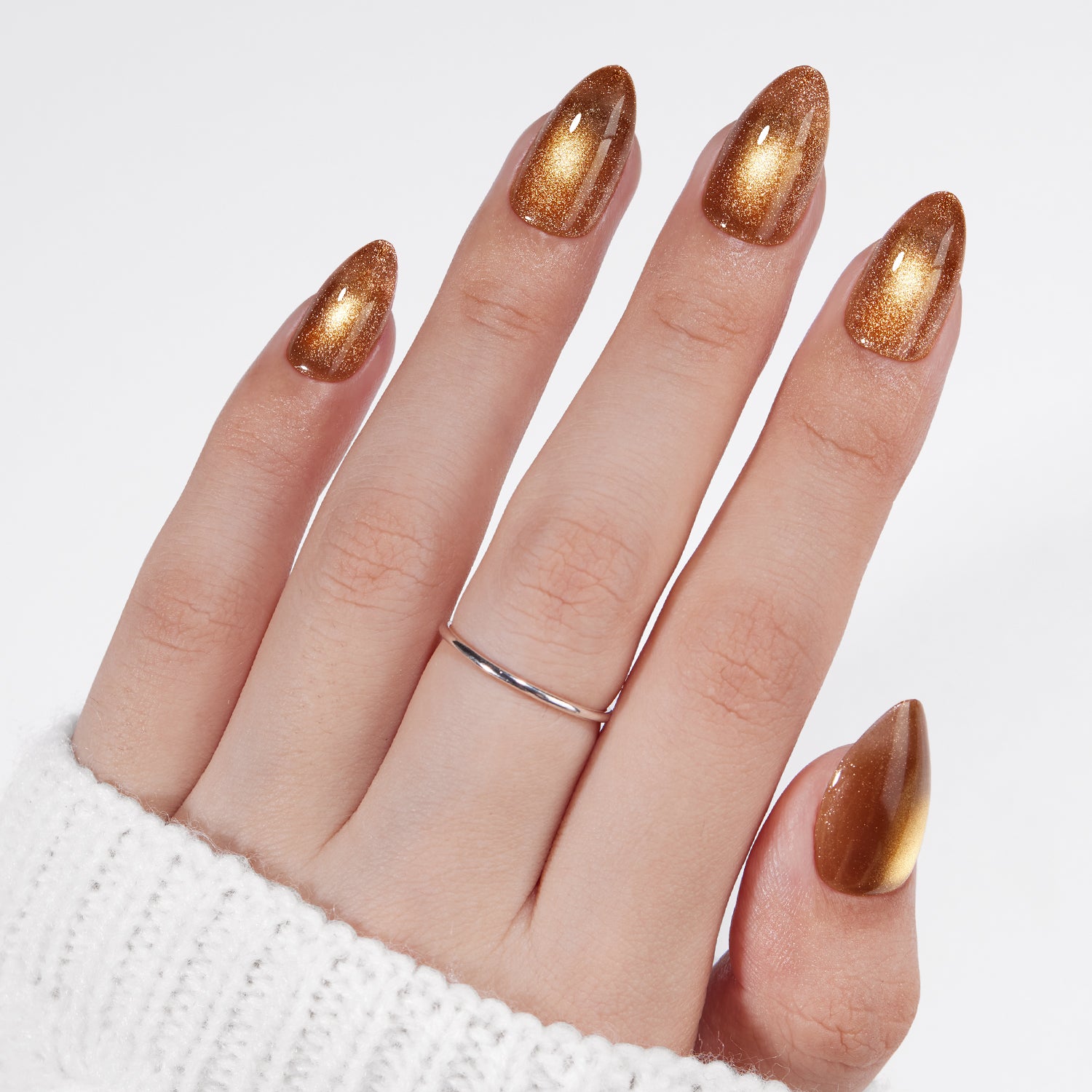 VSALON Nourishment Nails “Truffle Halo” Gold Short Almond Press On Nails – model wearing.
