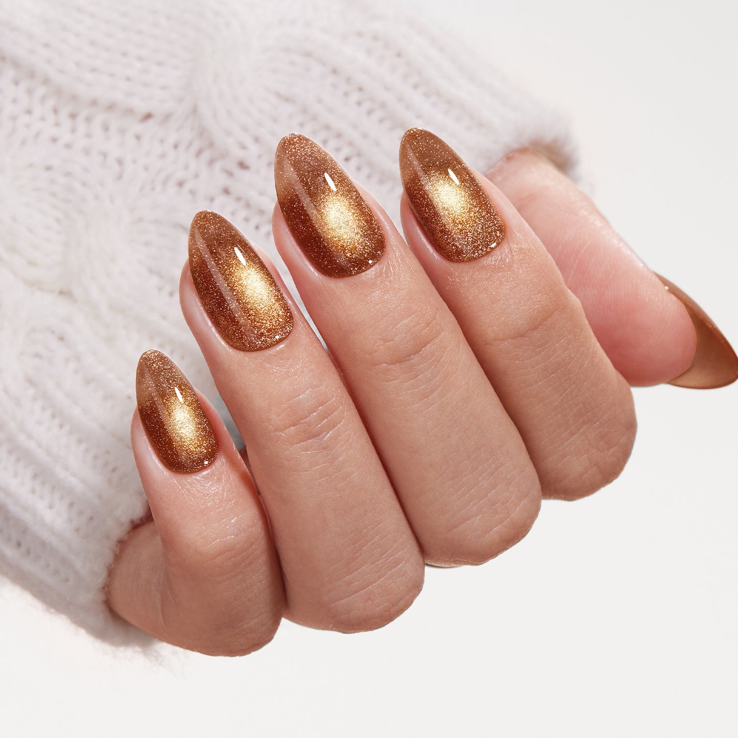 VSALON Nourishment Nails “Truffle Halo” Gold Short Almond Press On Nails – elegant look worn on hands.