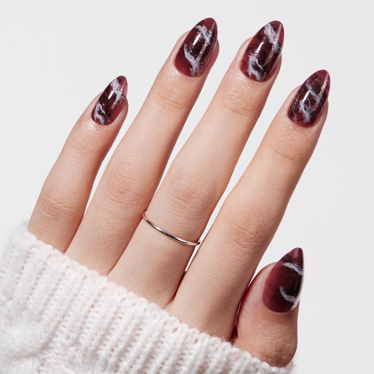 VSALON Nourishment Nails “Mocha Marble” Marble Short Almond Press On Nails – model wearing.