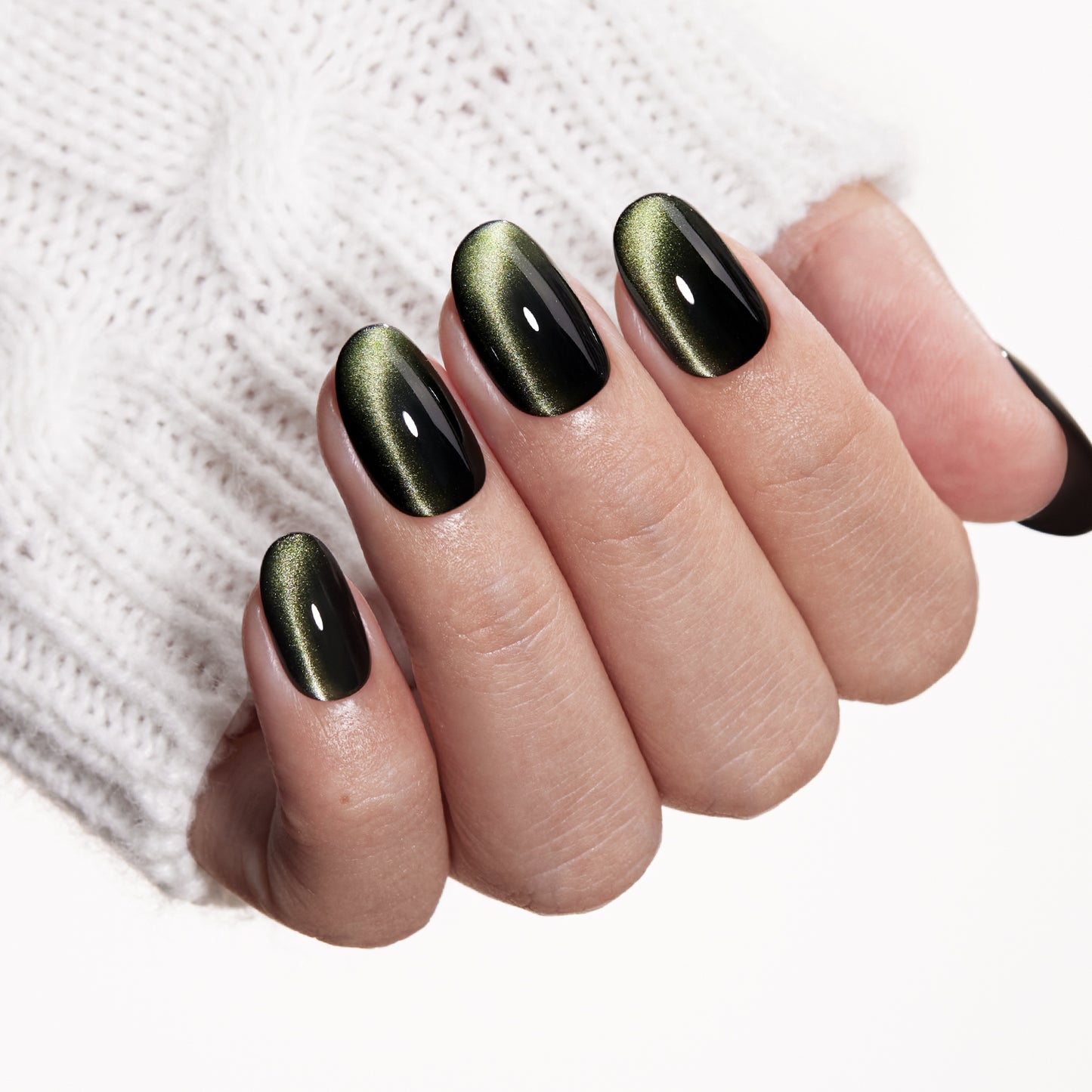 VSALON Nourishment Nails “Velvet Moss” Green Oval Press On Nails – natural look on hand model.