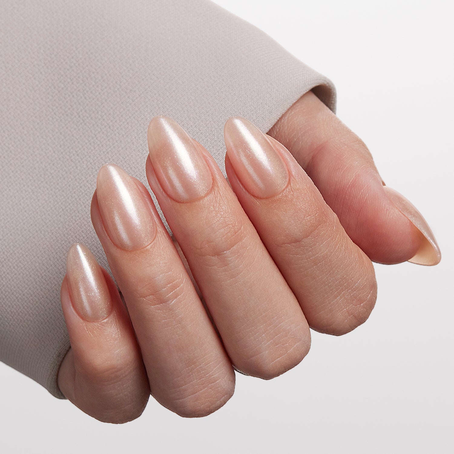 VSALON Dual Glam Nails Patriot Pearl Pearl Solid Color Short Almond Press On Nails - Close-up of model's hand bending fingers to hold VSALON press on nails – highlighting nail design and color details