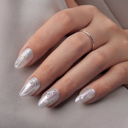 VSALON Dual Glam Nails Patriot Pearl Pearl Solid Color Short Almond Press On Nails - model's hand resting on elbow – showcasing nail style and elegant manicure