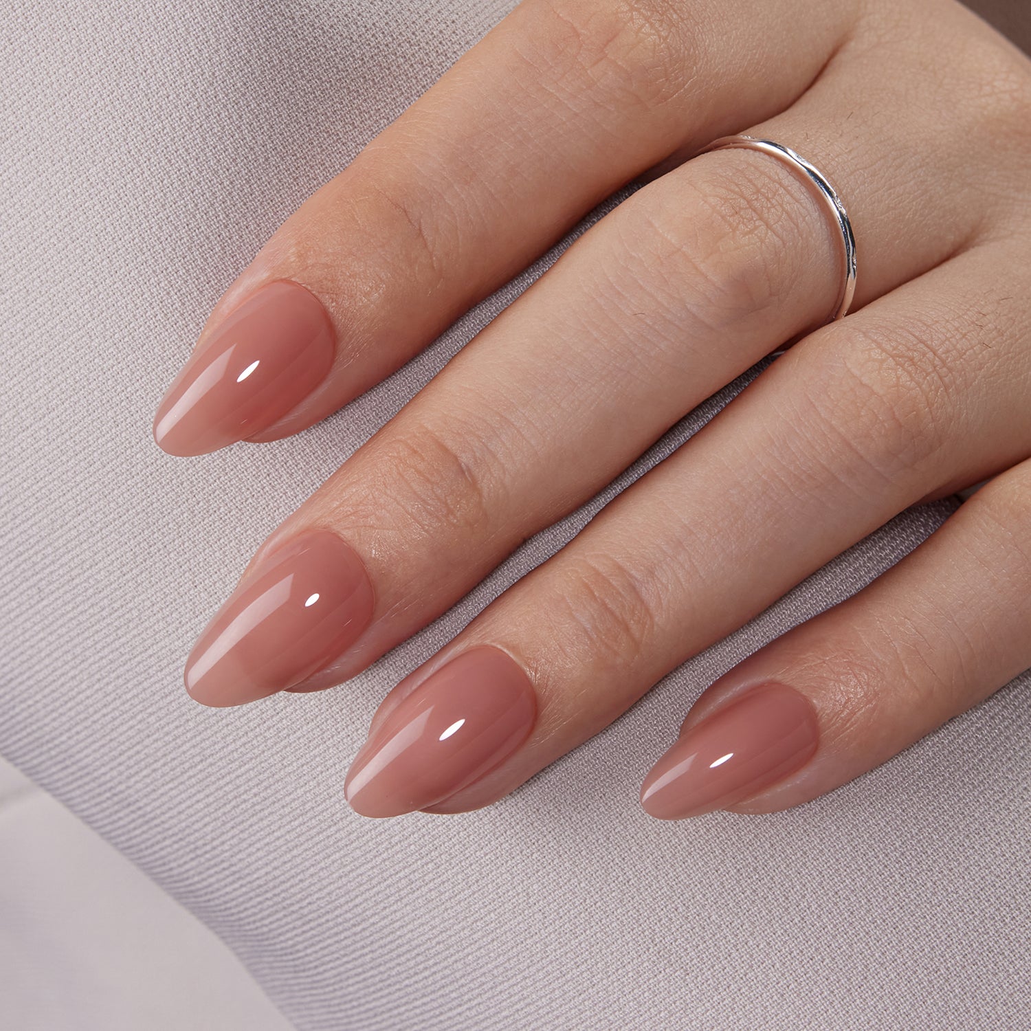 VSALON Dual Glam Nails Romantic Floral Pink Heart Short Almond Press On Nails - model's hand resting on elbow – showcasing nail style and elegant manicure