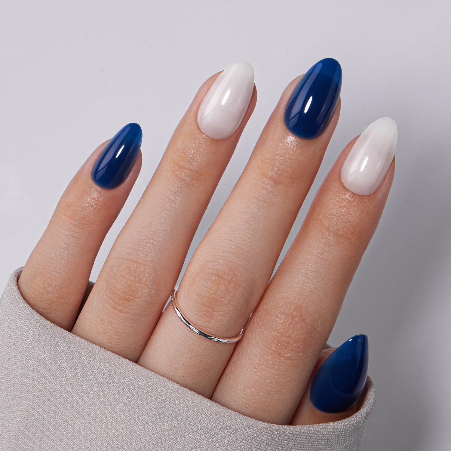 VSALON Dual Glam Nails Sky Cloud Blue Solid Color Short Almond Press On Nails - model wearing
