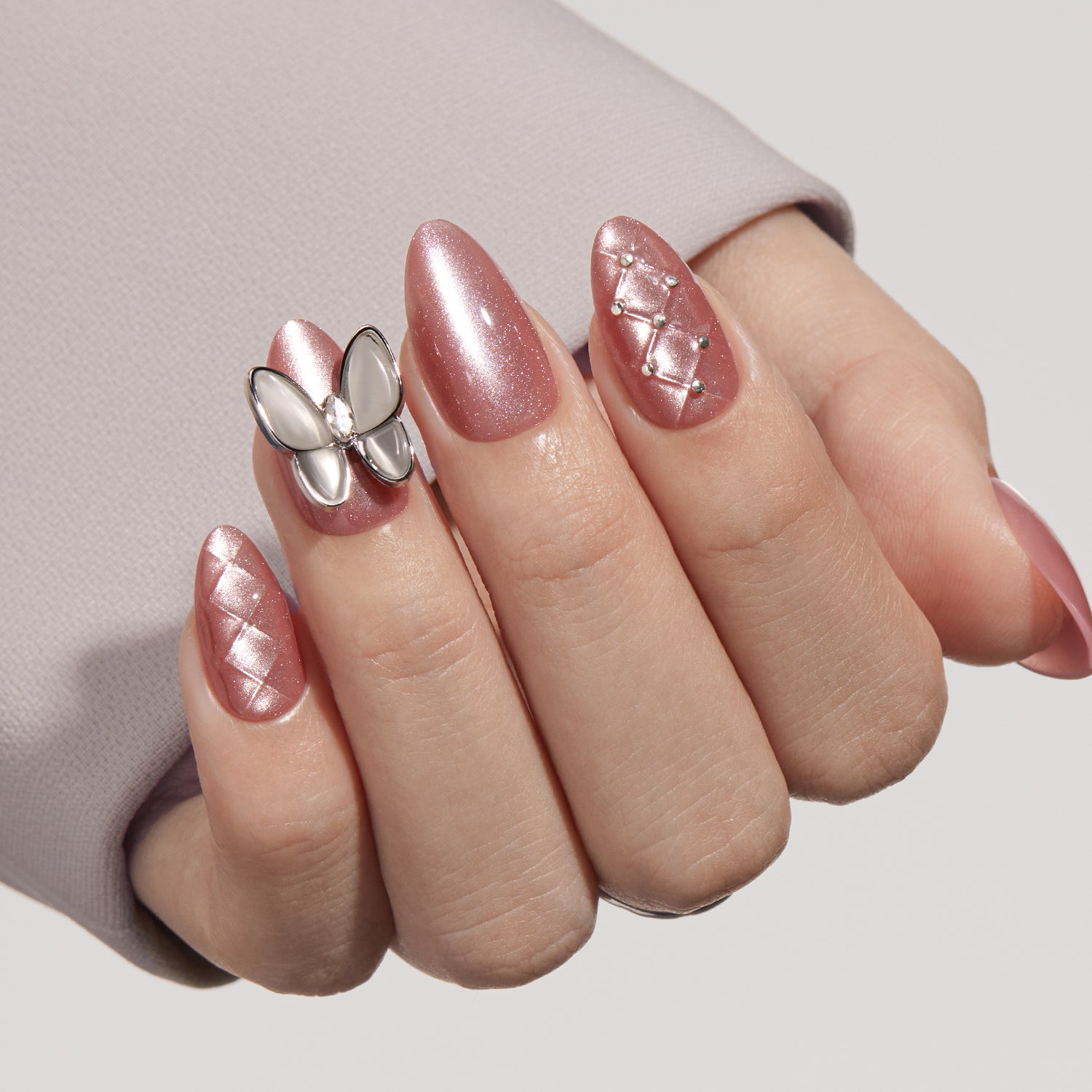 VSALON Nourishment Starlight Shines Pink Butterfly Short Almond Press On Nails - natural look on hand model