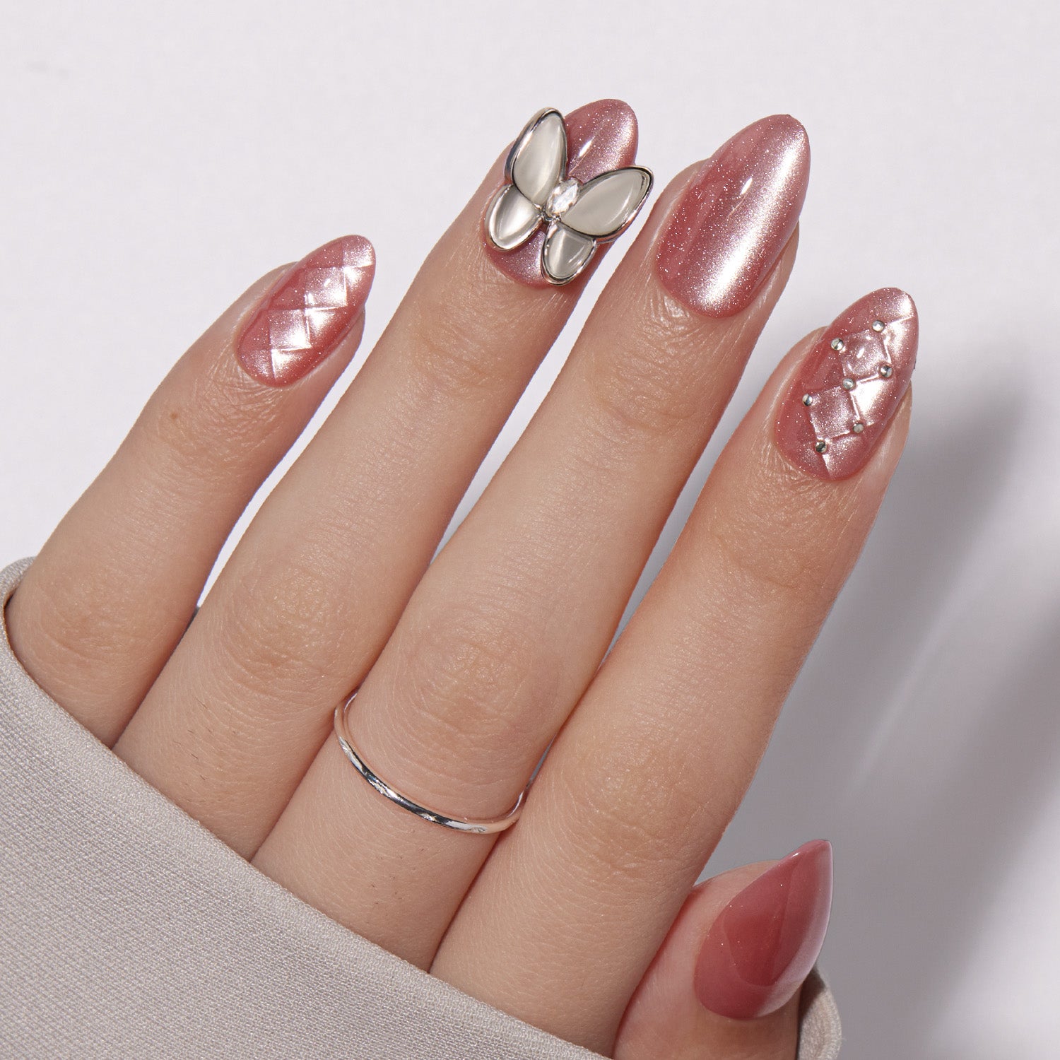 VSALON Nourishment Starlight Shines Pink Butterfly Short Almond Press On Nails - model wearing