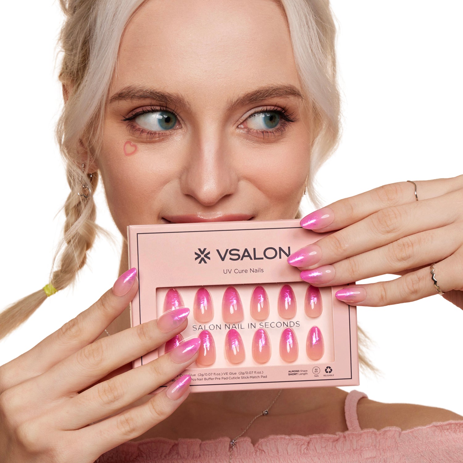 VSALON UV Cure Nails Unicorn Petal Gradient Flamingo Foil Pink Short Almond Press On Nails - Model holding VSALON press on nails box diagonally with both hands – highlighting packaging and nail set presentation