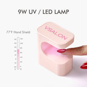 Model using VSALON LED nail lamp to dry gel nails for a salon-quality finish