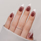 VSALON Nourishment Vampire Kiss Cat Eye Short Almond Press On Nails - model wearing