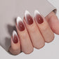 VSALON Nourishment Vampire Kiss Cat Eye Short Almond Press On Nails - model wearing