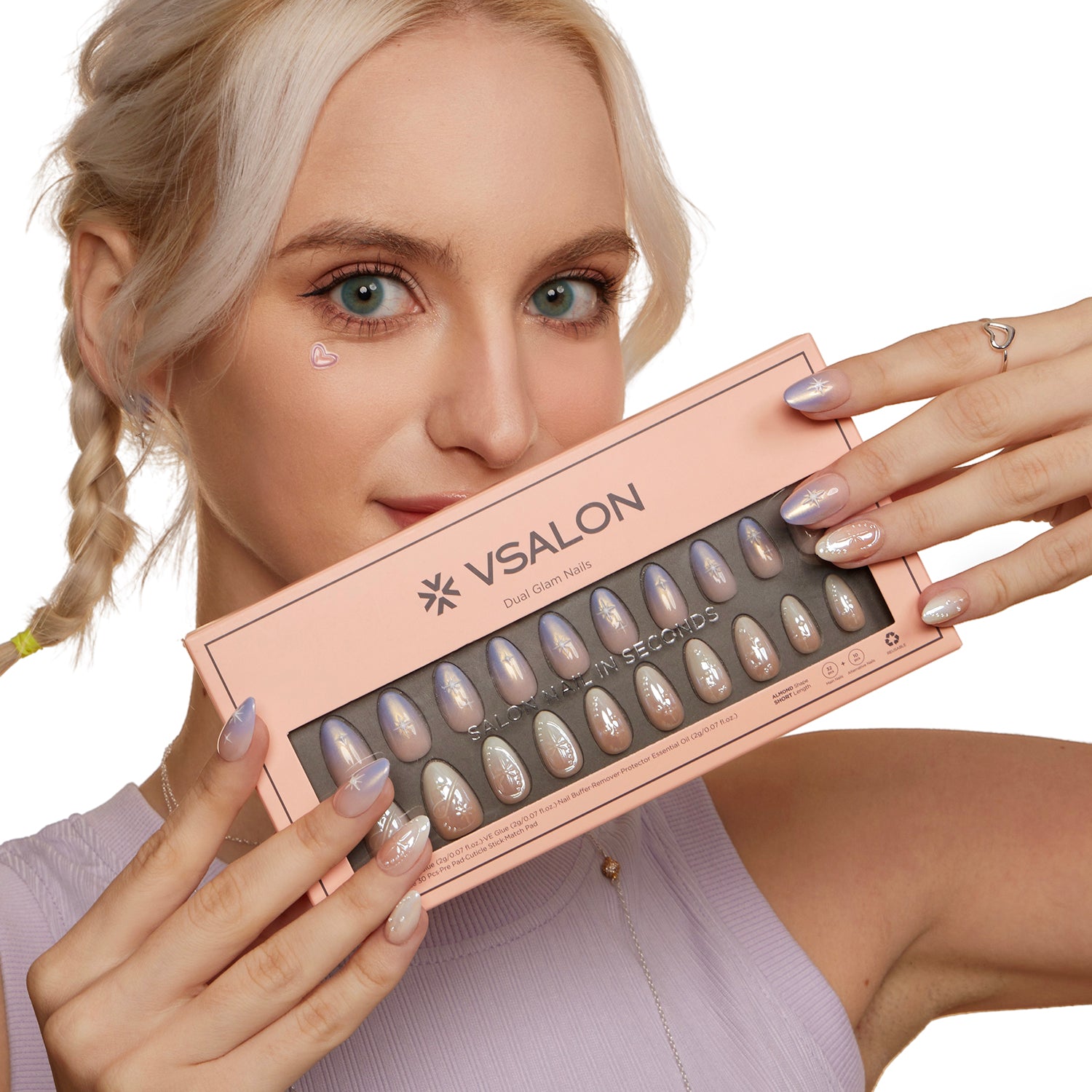 VSALON Dual Glam Nails Weekend Warrior Star 3D Textured Short Almond Press On Nails - Model holding VSALON press on nails box diagonally with both hands – highlighting packaging and nail set presentation