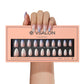 VSALON Dual Glam Nails Weekend Warrior Star 3D Textured Short Almond Press On Nails - model's hand holding the top of the box – displaying nail design and product packaging