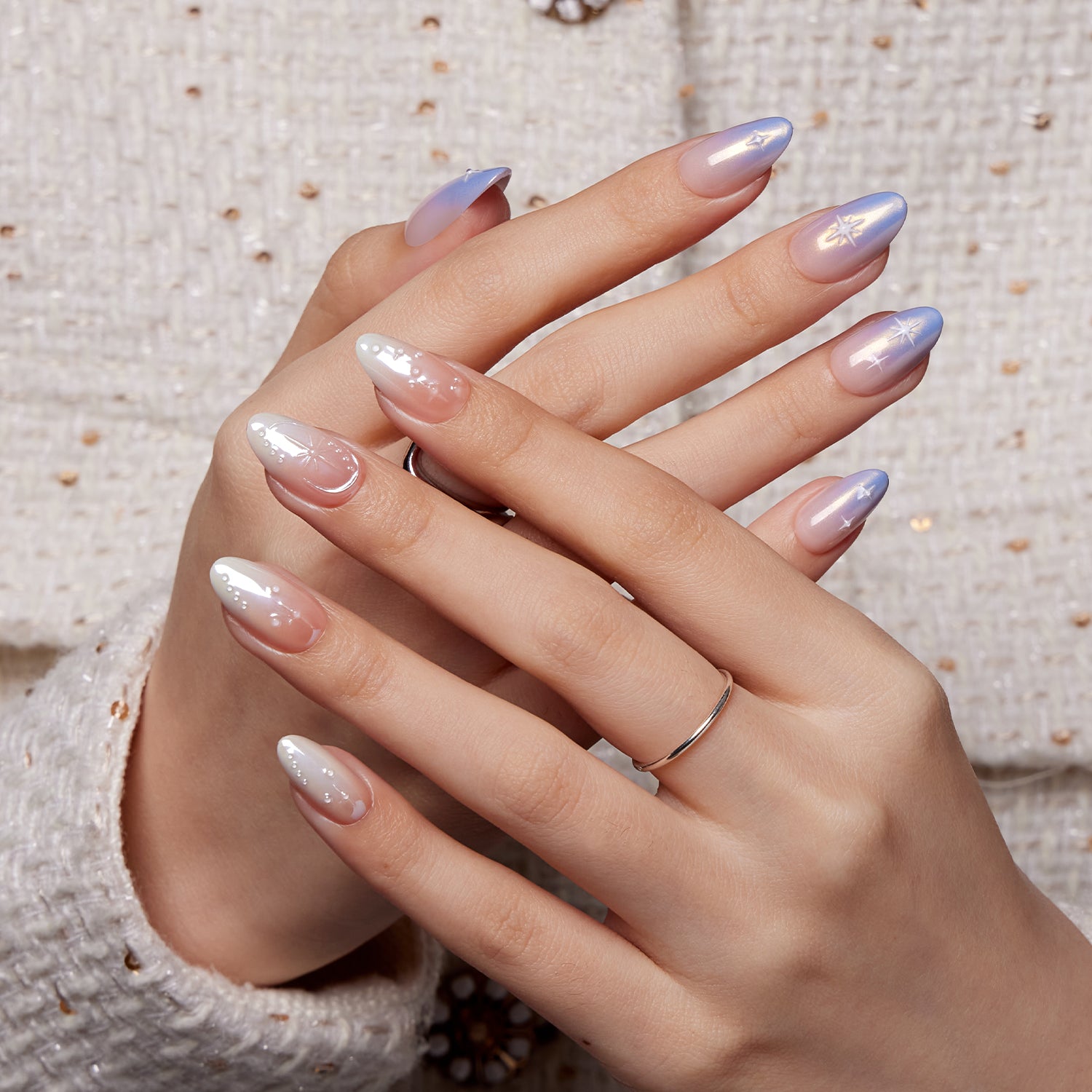 VSALON Weekend Warrior Gradient Stars Pearl Ombre 3D Textured Short Almond Press On Nails - Model's hands with fingers crossed showing VSALON press on nails – highlighting nail design and style